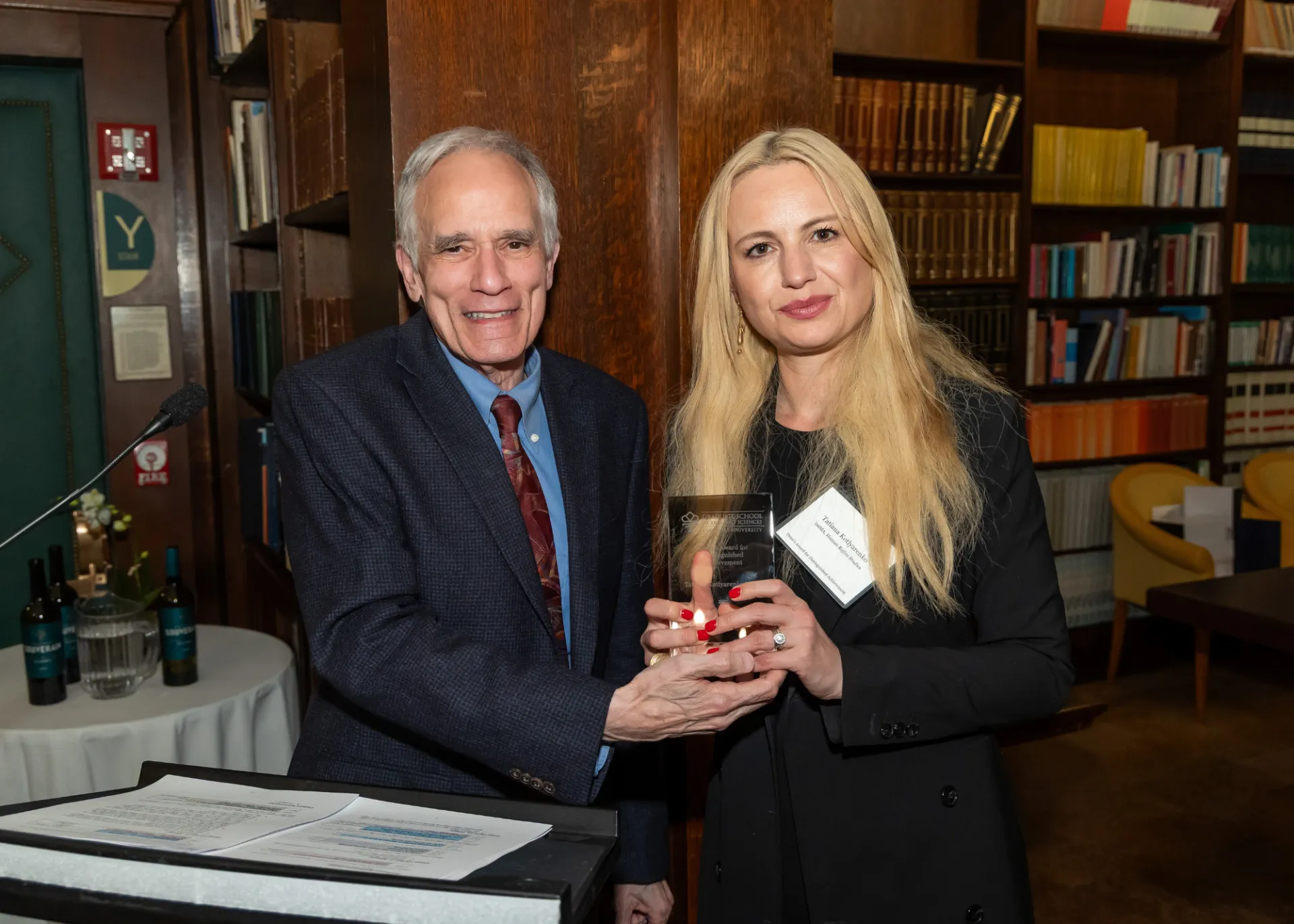 Student receiving award