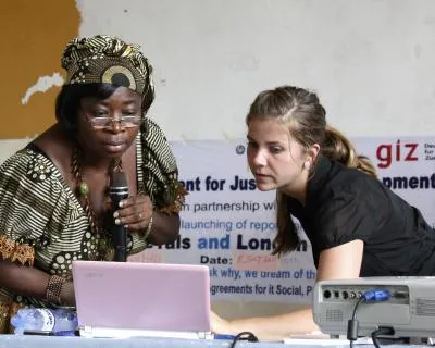 Image of Jennifer Wilmore (right) who volunteered in Sierra Leone in 2011.